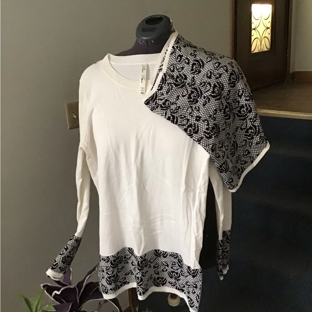 White Sweater with detachable scarf.